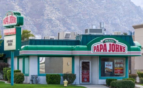 Papa John's Cuts Sales Outlook, Suspends Dividend Amid Weak North America Demand; Shares Sink