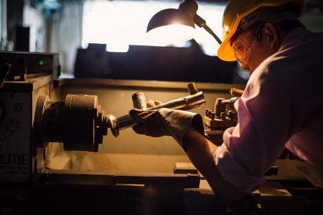 Japan Flash PMI Hits Five-Month High as Factory Output Surges, Services Soften